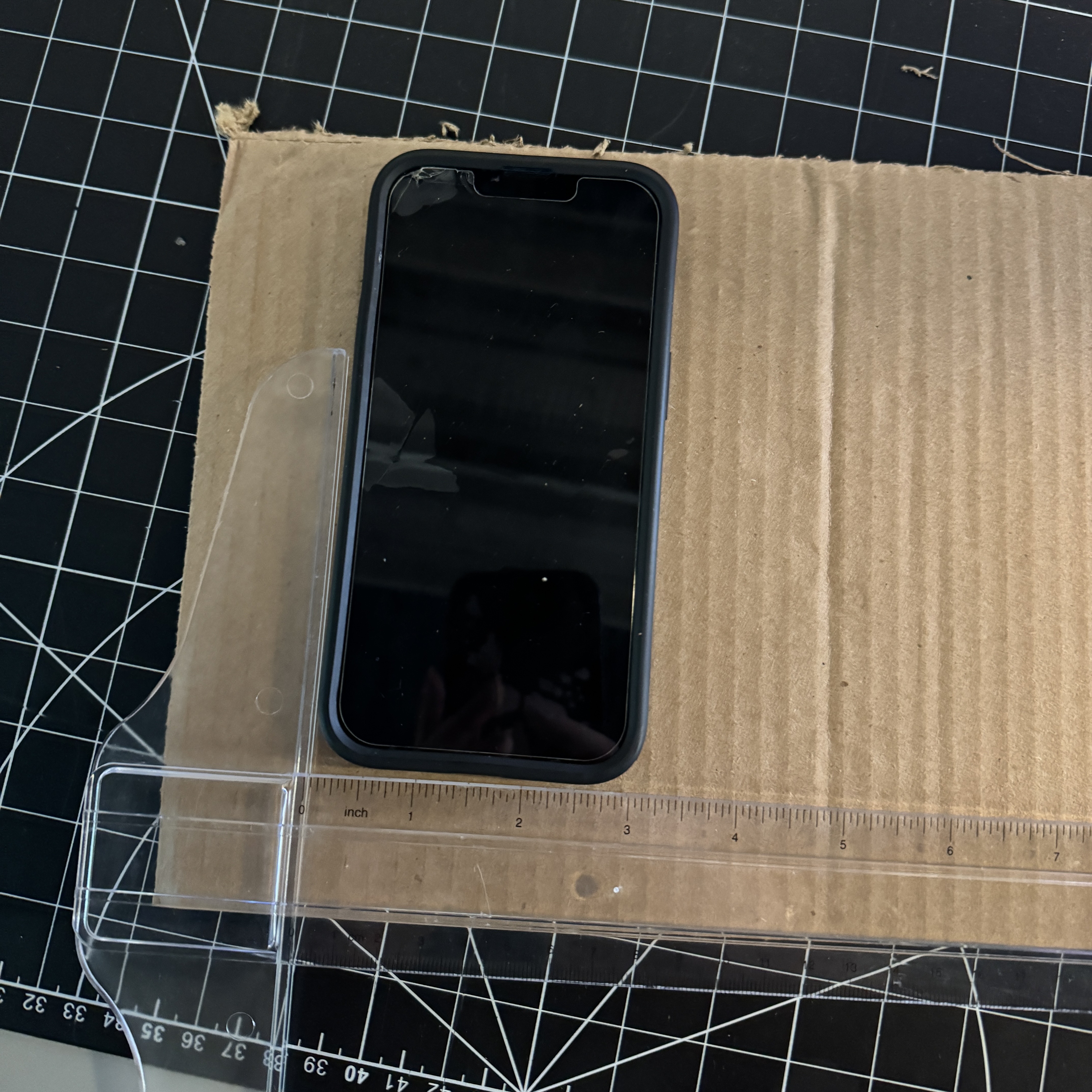 We started by measuring the width of the phone to make sure the stand was wide enough to hold it.